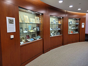 Camp Yonahlossee for Girls materials on display in library exhibit cases