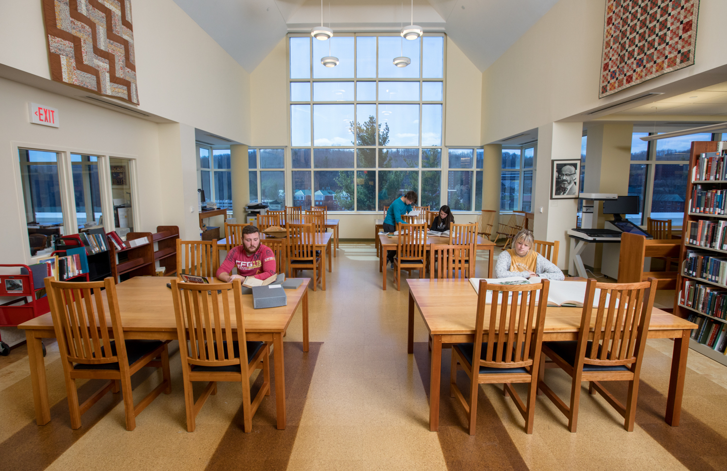 Researchers working at tables in Special Collections Research Center reading room