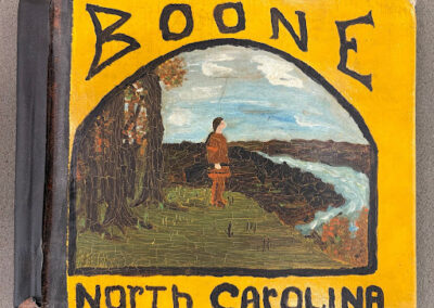 Illustrated cover of a handmade student history book about Boone